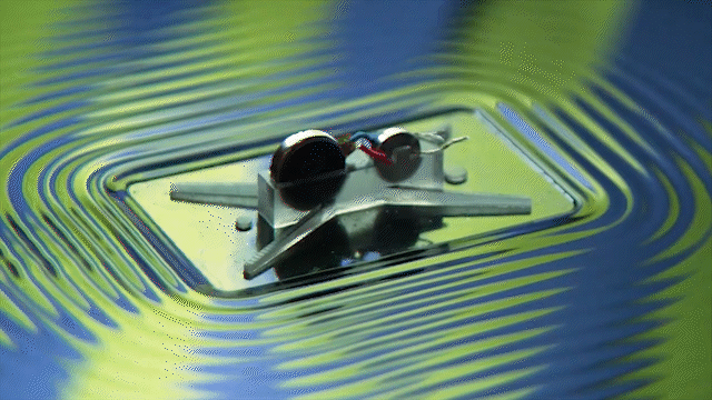 SurferBot: a wave-propelled aquatic vibrobot